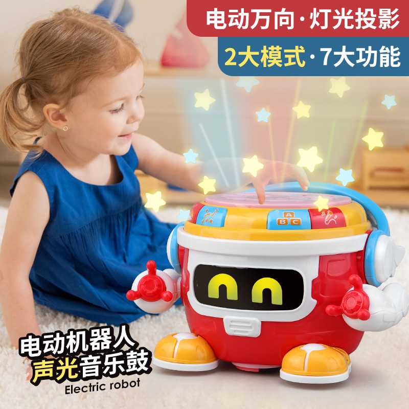子供は早くロボットに電気ダンスのおもちゃを教えます。|undefined