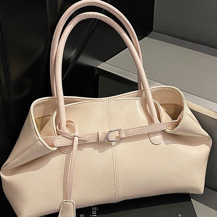 Bolsos de tendencia diaria coreana 2026 primavera nueva moda simple gran capacidad bolso de hombro bolso especial