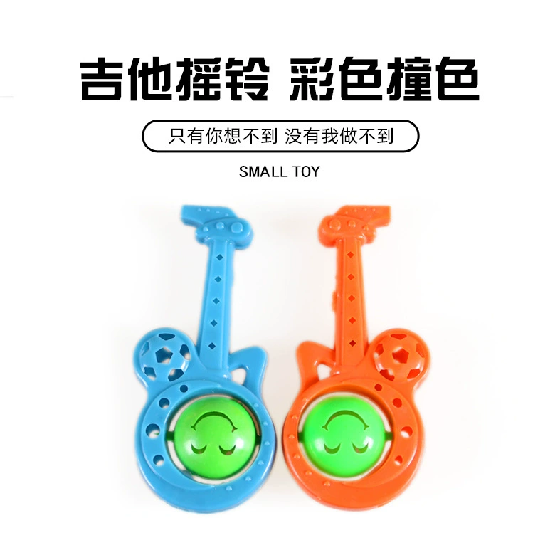 Заводская поставка Детские игрушки Смайлик-гитара Погремушка с ручным приводом Маленький колокольчик Подарок для детского сада Пищевые аксессуары Игрушки