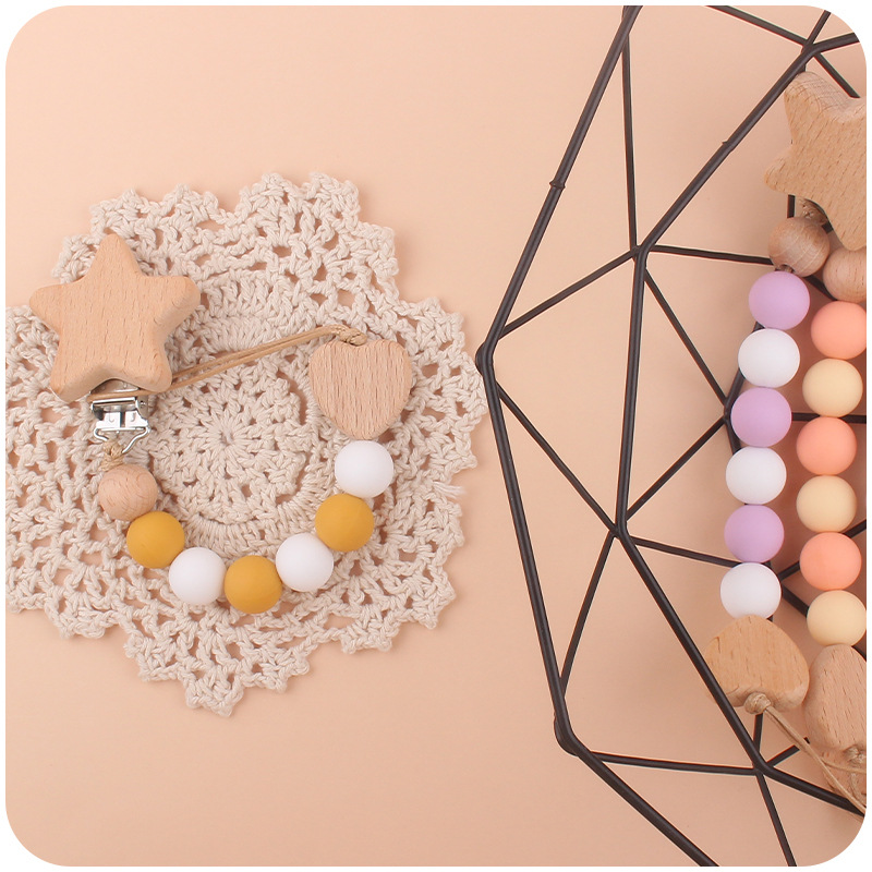 Nuevos suministros para bebés Star Beech clip creativo Beech amor calmante bebé mordedura molar pezón cadena