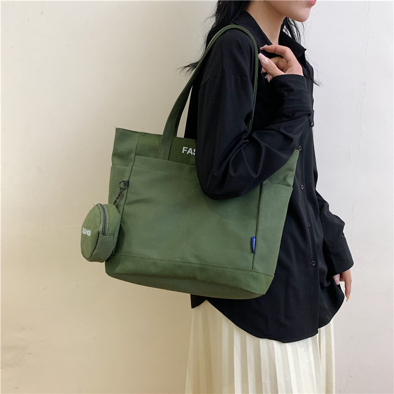 Bolsa de gran capacidad para mujeres 2026 nuevo estilo coreano in-modes simple bolso de clase bolso de hombro para estudiantes universitarios