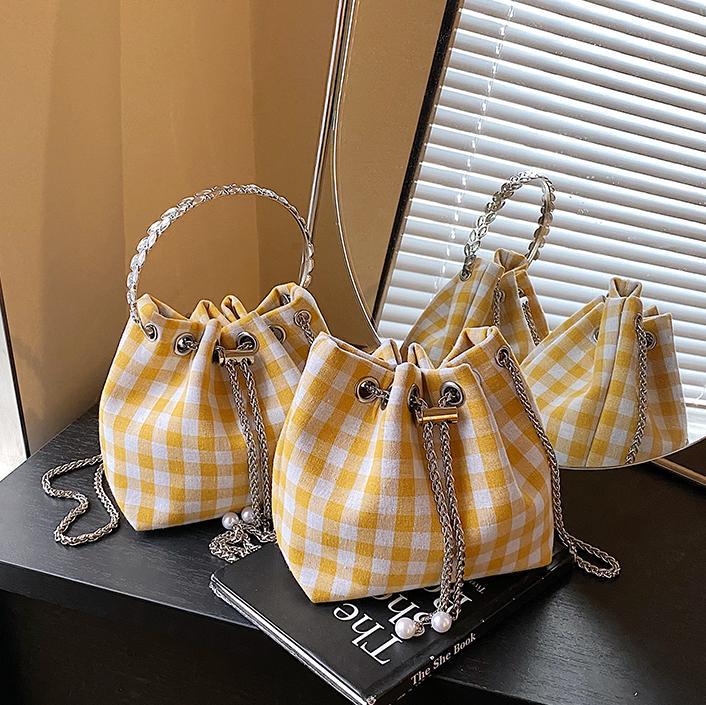 Bolso de cubo de lona a cuadros popular de este año bolso de hombro con cadena de estilo nuevo para mujer 2025 bolso de mensajero versátil de moda