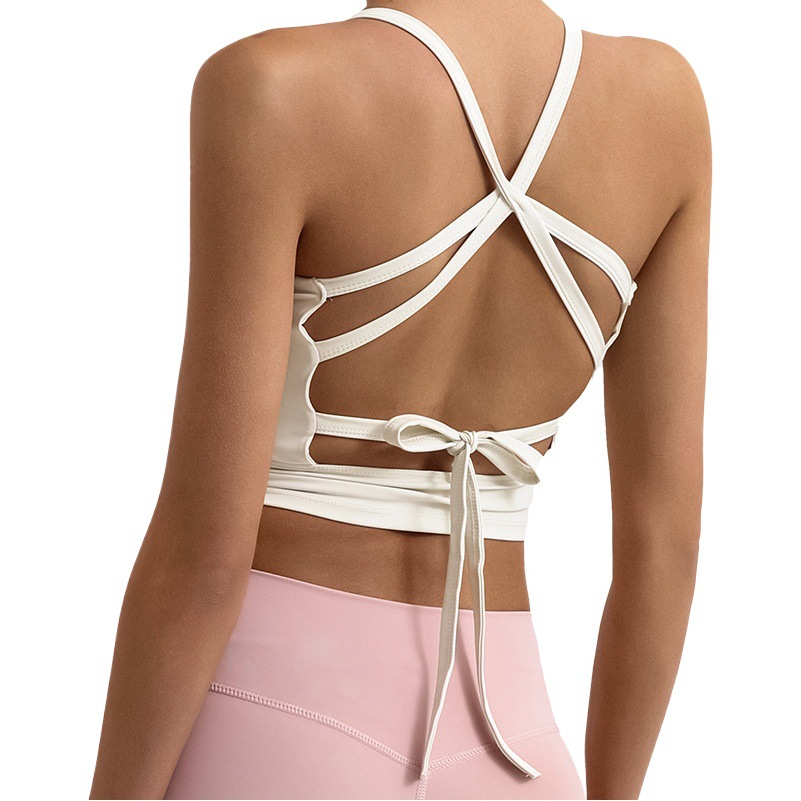 Camiseta de yoga de nuevo estilo para mujer con diseño de espalda cruzada, almohadillas incorporadas en el pecho, alta elasticidad, secado rápido, adecuada para deportes, fitness, correr y entrenamiento.