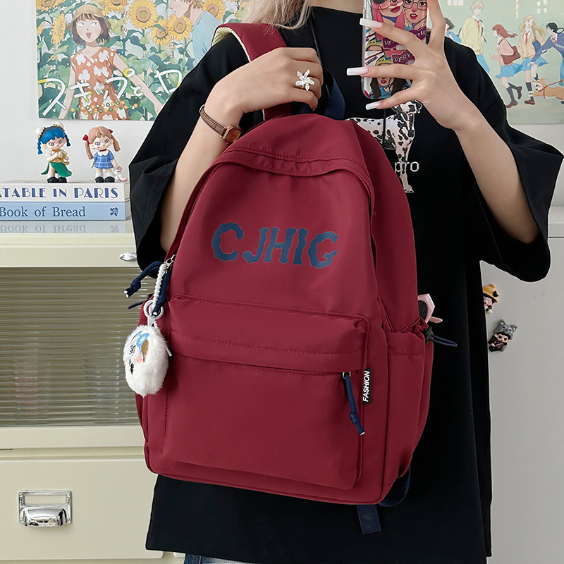 新しいスタイルのレタートレンディでクールな学生スクールバッグ、軽量で大容量、中学生と高校生向けのシンプルで見栄えの良いバックパック卸売|undefined