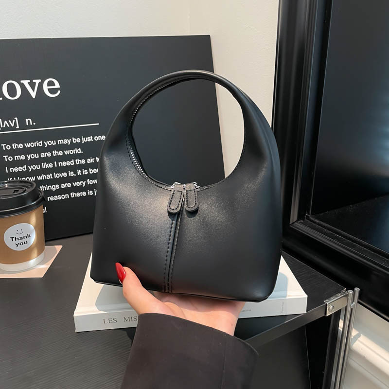 Bolso de diseño de nicho Tide2025 nuevo bolso de mano encantador para mujeres texturas retro versátiles bolso de mano