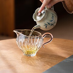 厚い高温ガラスの公道の杯の高級な透明な茶器の家庭用の工夫の茶器は持ちます。