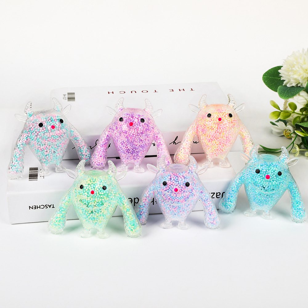 Amazon transfronterizo nuevo producto pequeño monstruo espuma partículas de descompresión amasar música divertida fábrica de juguetes de descompresión al por mayor