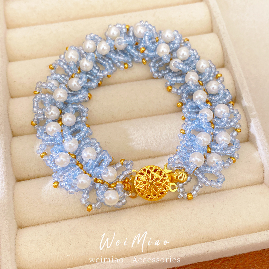 Accesorios de vacaciones pulseras de perlas ligeras de lujo nicho pulseras de alto nivel personalidad temperamento de moda joyas al por mayor