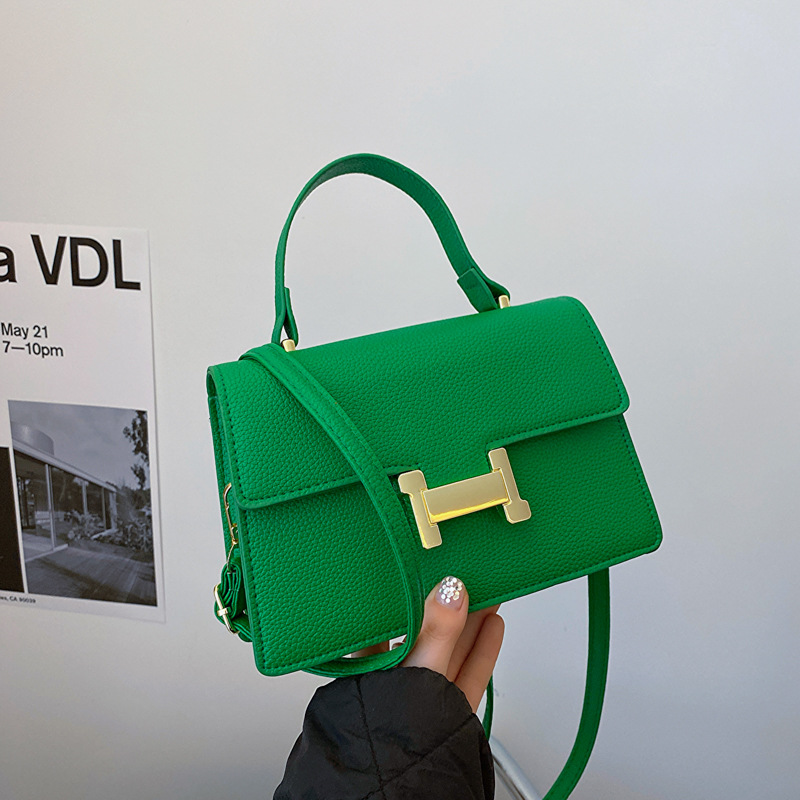 Bolso popular este año 2024 nueva textura bolso de mano cuadrado lichi patrón bolso de viaje de mujer mochila de hombro casual