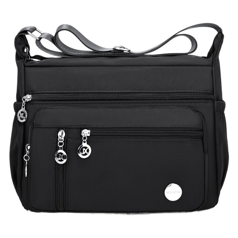 Moda casual transfronteriza de lentejuelas de nylon impermeable simple ligero cremallera bolsa de viaje de gran capacidad crossbody bolsa de distribución femenina