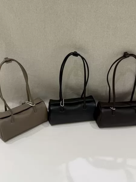 High-end, minimalist design, first-layer cowhide bowling bag, pillow bag, commuter tote, shoulder bag, and underarm bag – a trendy choice