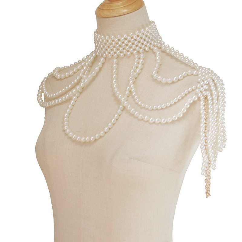 Joyas transfronterizas europeas y americanas cadena de cuerpo de perlas hueca creativa moda sexy chal de perlas borla cadena de pecho de alta calidad