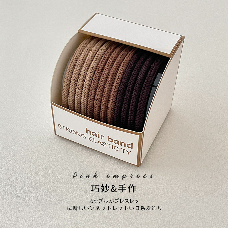 Serie de leche de color marrón de alta banda de goma elástica duradera cuerda del lazo del pelo de las mujeres cuerda de cabeza nueva toalla simple rollo banda de pelo cubierta de cuero