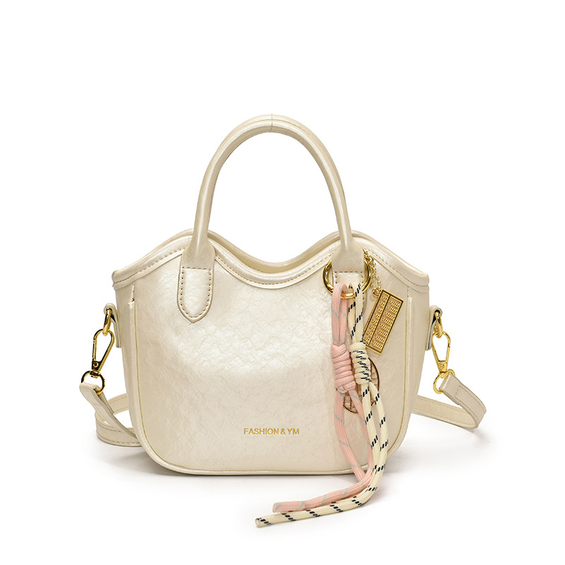 2025 nuevo bolso de mensajero casual de todo fósforo de moda, bolso de cubo portátil exquisito de alta gama, bolso de hombro de estilo occidental brillante