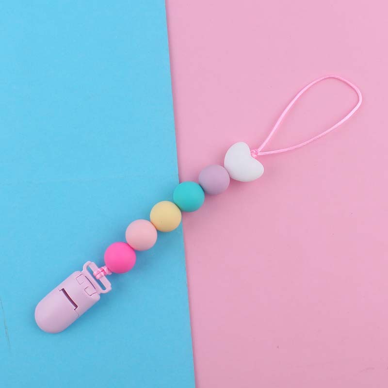 Nuevo bebé suministros de dibujos animados amor silicona DIY creativo macaron color serie mordedura cola molar pezón