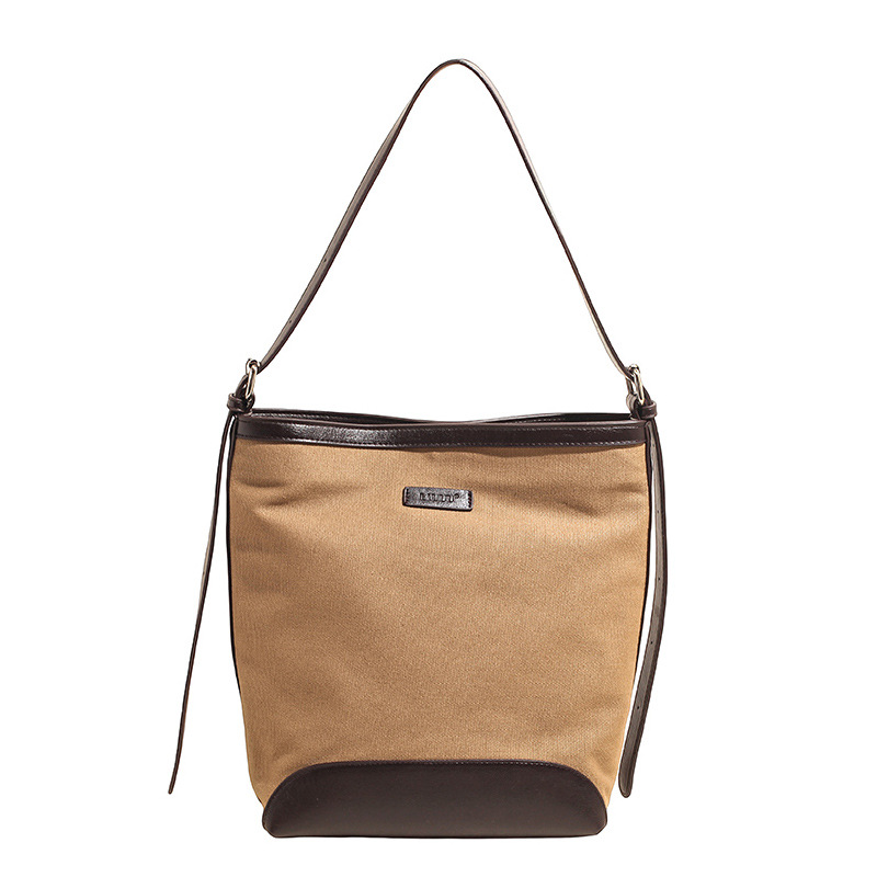 Transfronterizos de gran capacidad bolso de balde de mujer bolso versátil otoño / invierno 2025 nuevo tipo de mochila de hombro casual bolso de transporte