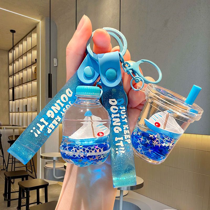 Acrylic sailing oil quicksand bottle key chain small gift gift wholesale schoolbag pendant small jewelry key chain