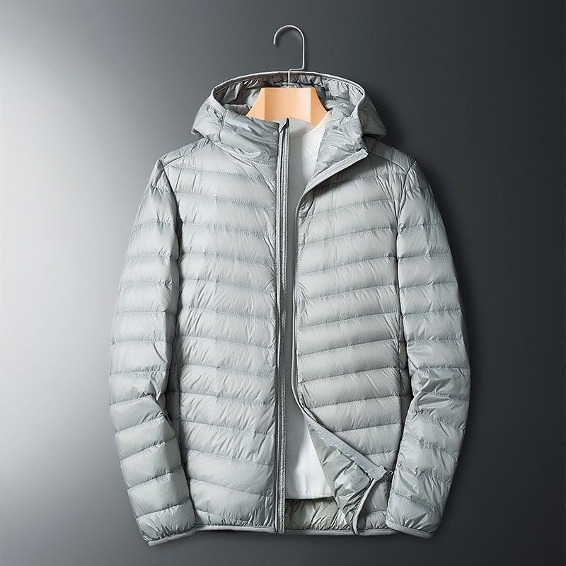 Chaqueta de algodón de terciopelo ligero para hombres de calidad Chaqueta deportiva cálida de moda de otoño e invierno de gran tamaño con cuello alto corto para hombres