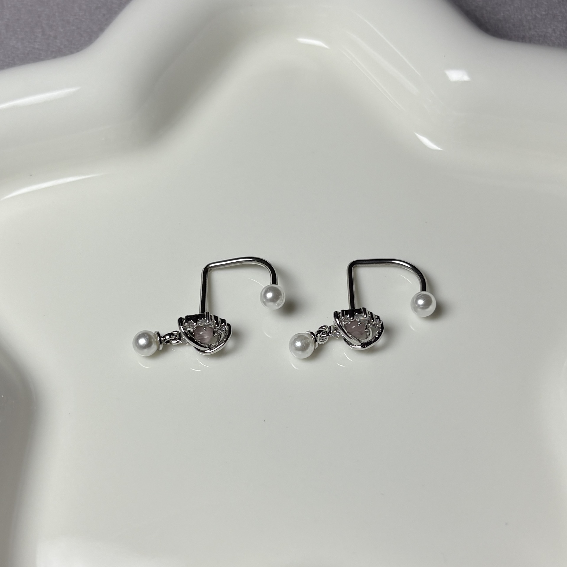 Silver pointed spike labret stud material detail