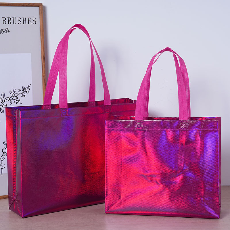 Bolsas de tela no tejida personalizadas fabricantes de alta calidad bolsas de mano no tejidas personalizadas bolsa de compras de ropa de mujer