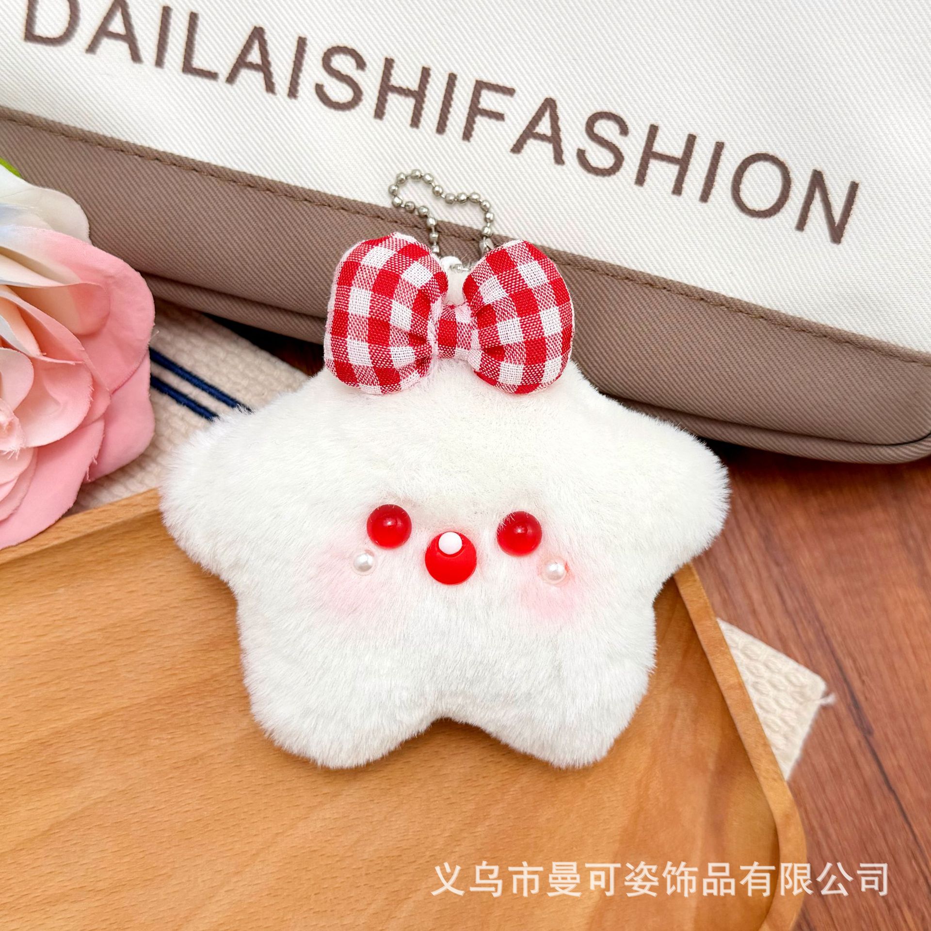 Red plaid bow with star on its mouth