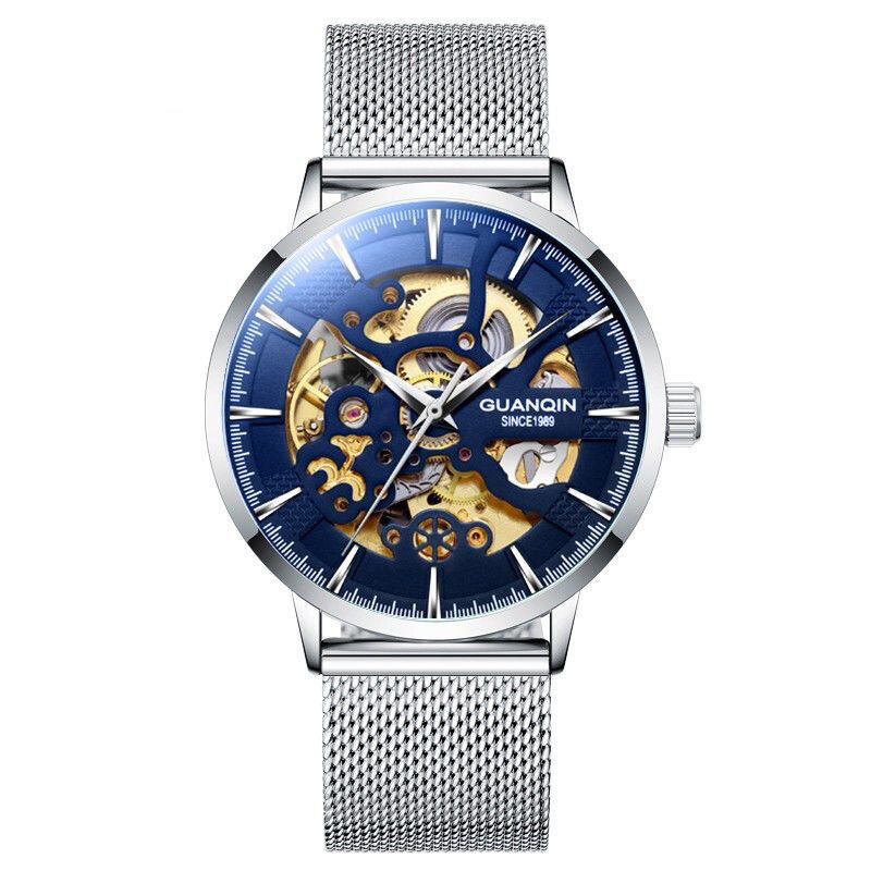 Cinturón de malla blanca con cara azul de concha plateada