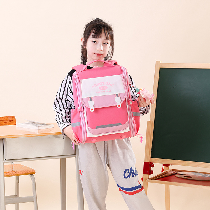 Natural Fish 2025 nuevas mochilas escolares para niños y estudiantes de grado 1-3 versión coreana de gran capacidad para reducir la carga y proteger la columna