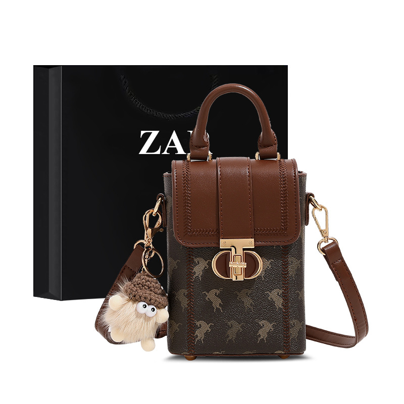 Otoño y invierno mini bolso de mujer 2026 nuevo nicho de hombro pequeño bolso de hombro de alto nivel bolso de mano pequeño bolso de teléfono móvil