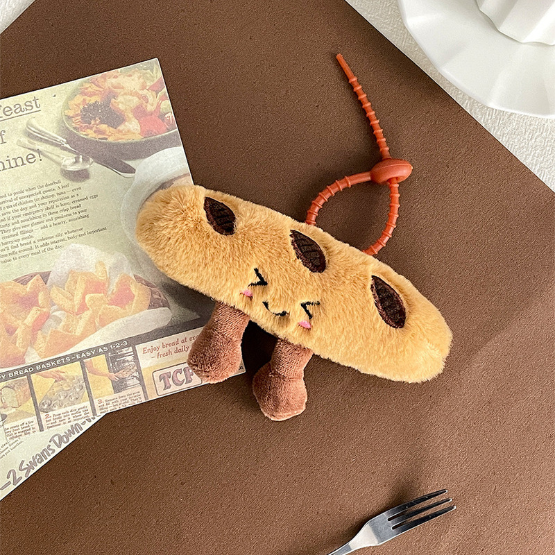 趣味のシミュレーションの食べ物のぬいぐるみのぬいぐるみのペンダントのキーホルダーのタコのサンドイッチの人形は牛の角のカバンの子供を賛美することができます。|undefined