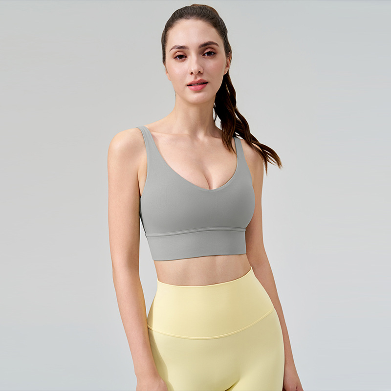 La nueva ropa interior deportiva a prueba de golpes transfronteriza para mujeres se reúne profundamente V fitness hermosa espalda desnuda con almohadilla para el pecho sujetador de yoga sin costuras