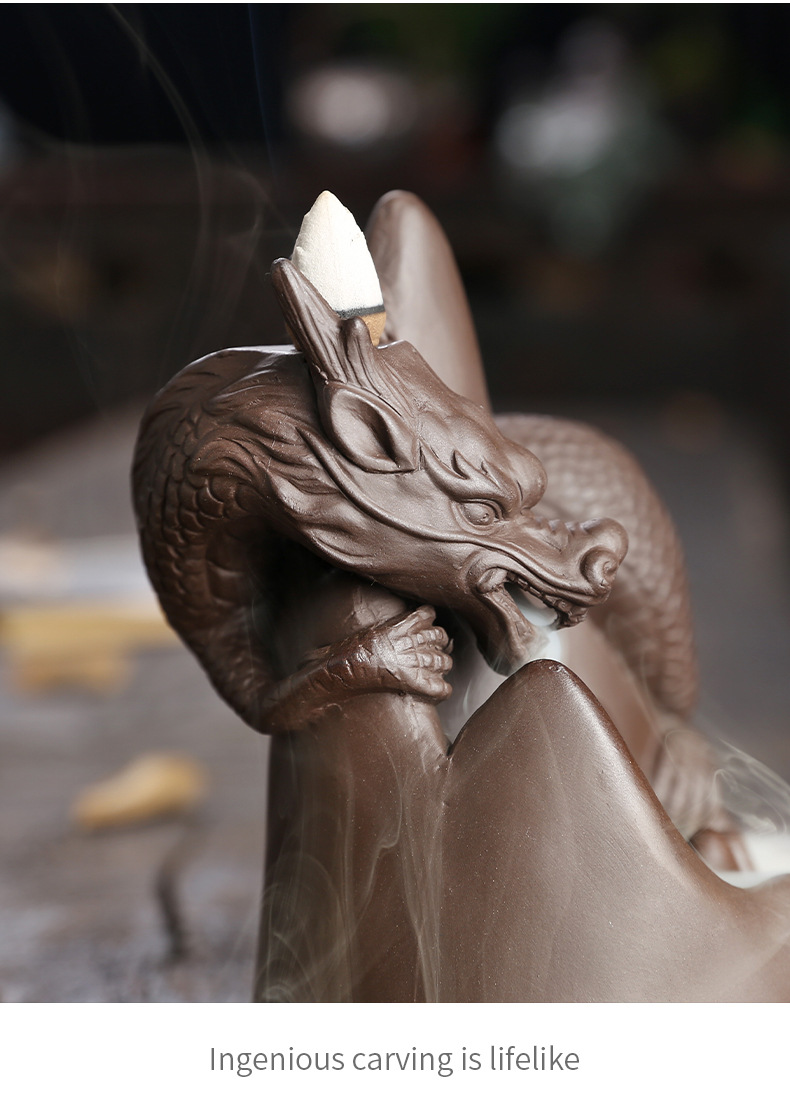 This handmade Purple Sand Dragon Backflow Incense Burner is the perfect addition to any room. With its intricate design and durable construction, you'll be enchanted by the mystical smoke that cascades down the figure.