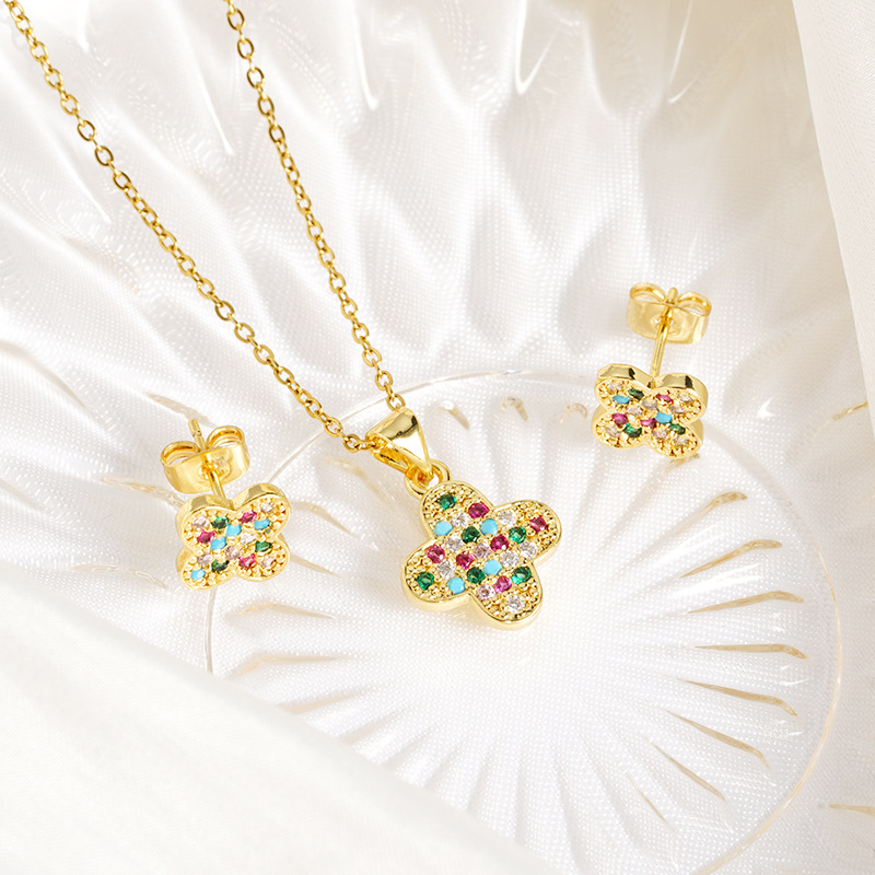 Moda de oro de arena de Vietnam, color de lujo ligero, incrustaciones de diamantes, collar de flores de cuatro hojas, pendientes, joyas transfronterizas para mujeres que no se desvanecen durante mucho tiempo