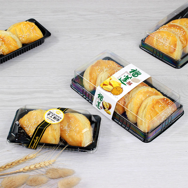 Caja de embalaje de 2 / 5 cápsulas de tortilla de durian transparente rectangular trapezoidal succionada horneado West Point desechable 609 caja de embalaje