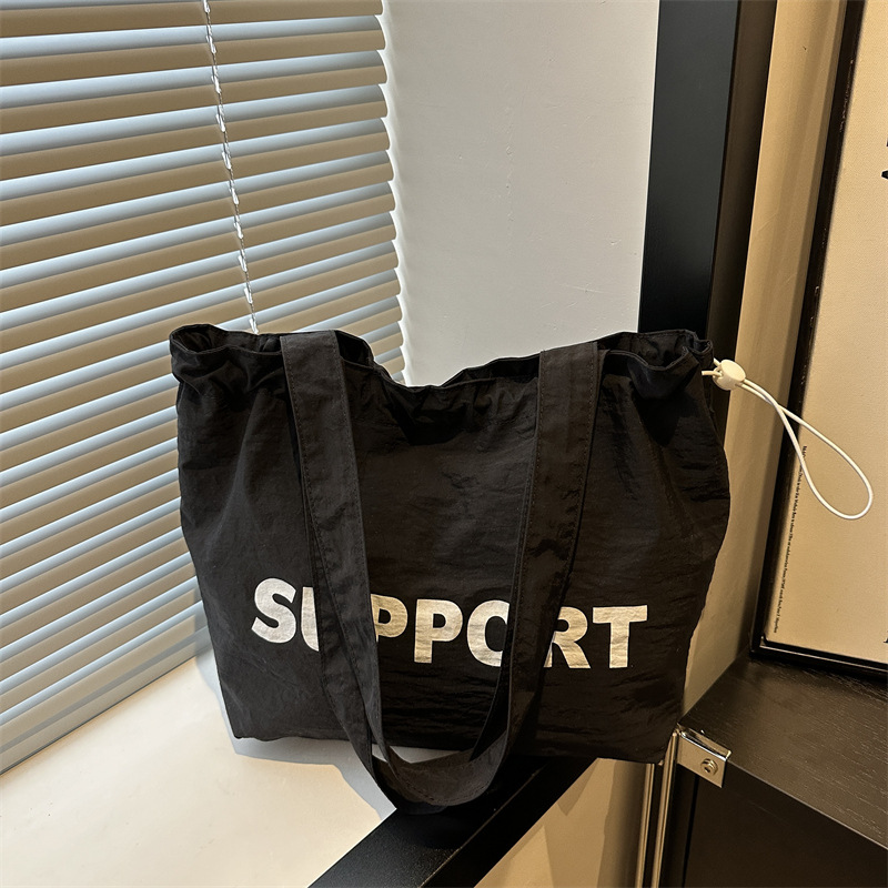 letras coreanas bolsas de lona para mujeres 2024 otoño nuevo relajado bolsas de clase de estudiantes universitarios de gran capacidad bolsas de nylon