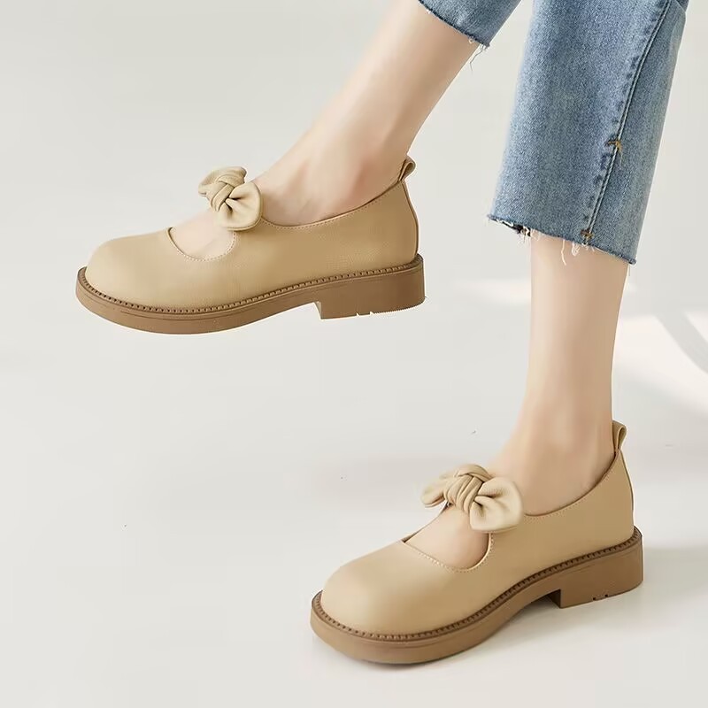 Zapatos de cuero retrógrados franceses para mujeres 2026 nuevo arco superficial verano perezoso zapatos de moda de una sola pie