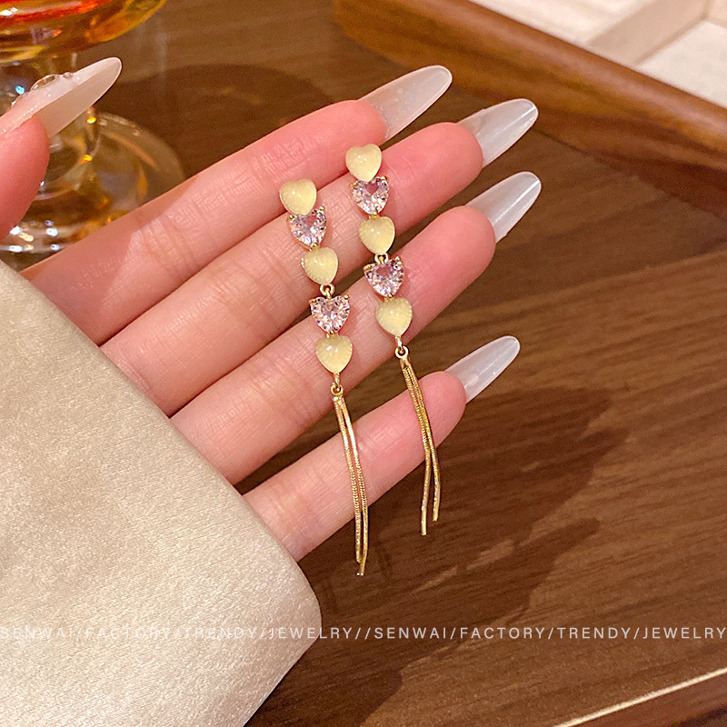 Pendientes de borla de circonio con garra de sentido avanzado de plata 925 Pendientes largos de temperamento de nicho de lujo ligero femenino Pendientes delgados de cara redonda