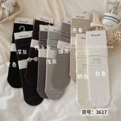 大地色秋冬袜子女无骨精梳棉中筒袜带跟直板袜纯色简约高筒堆堆袜