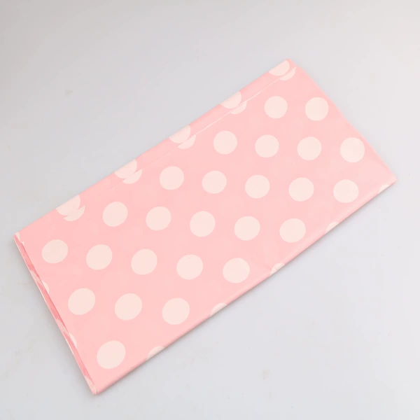 1 light pink and white polka dot tablecloth