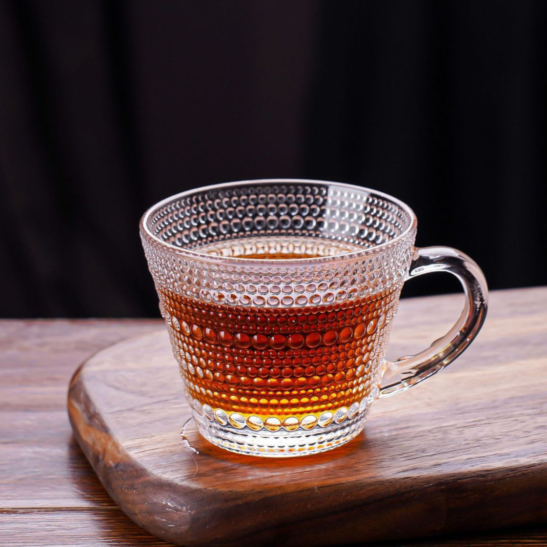 Juego de tazas y platillos de café de vidrio en relieve doméstico Concentración italiana engrosada Taza de té de vidrio resistente al calor simple de estilo europeo