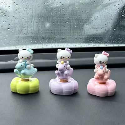 Creative and cute rotating Hello Kitty car ornament, suitable for electric car interiors, car dashboard, and office desk decoration (Car ornaments) - rotating-kt-cat-family-portrait-3-pieces-with-adhesive