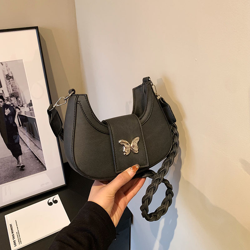 Bolsos de nicho populares para mujer 2024 invierno nueva cadena de moda simple bolso de hombro casual coreano bolso de luna nueva para mujer