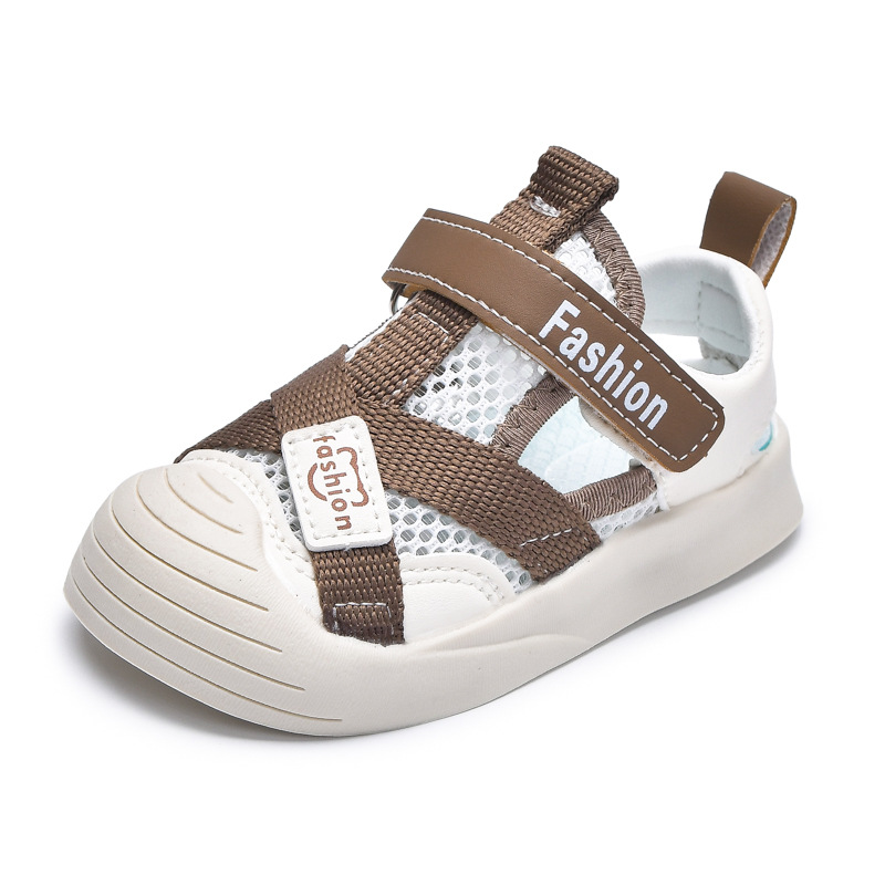 2025 zapatos de red de verano nuevas sandalias para niños de fondo suave Baotou protección para pies hombres y mujeres zapatos para bebés zapatos de marco versión coreana