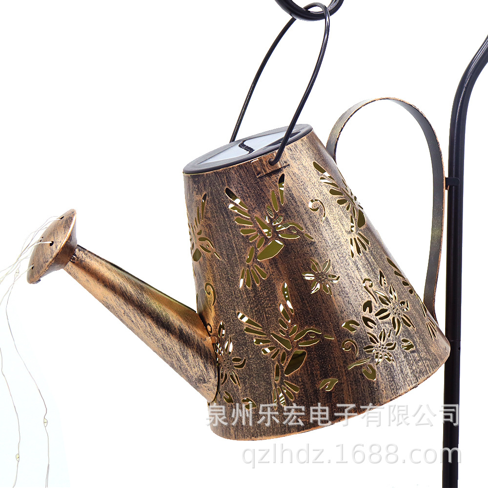 Transfronterizo nueva caldera de hierro lámpara de césped lámpara de jardín lámpara de paisaje agua Libélula lámpara de proyección de dibujos animados