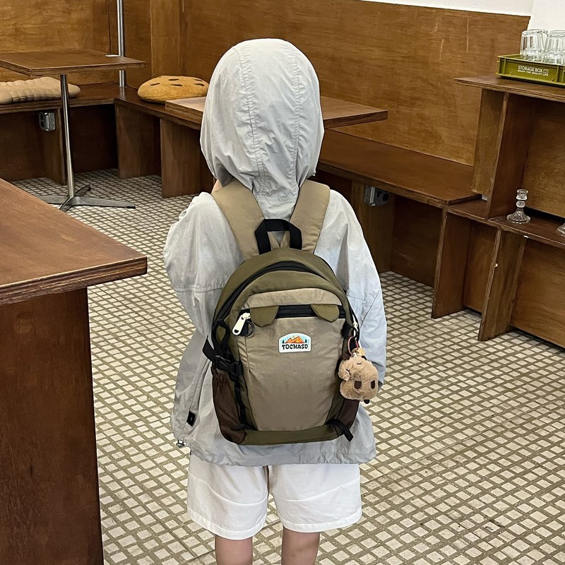 2026 nueva mochila infantil caricatura encantadora con colgantes mochila de niños y niñas de gran capacidad de la escuela primaria mochila de la marea