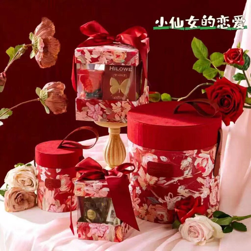 春の絵のにぎやかな丸いバケツのお土産の箱の高級感の花嫁の結婚式の手提げの喜糖の箱の空の箱のプレゼントの箱|undefined