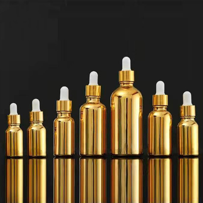 批发时尚玻璃精油瓶电镀金色精华滴管瓶便携按压喷雾瓶原液分装瓶