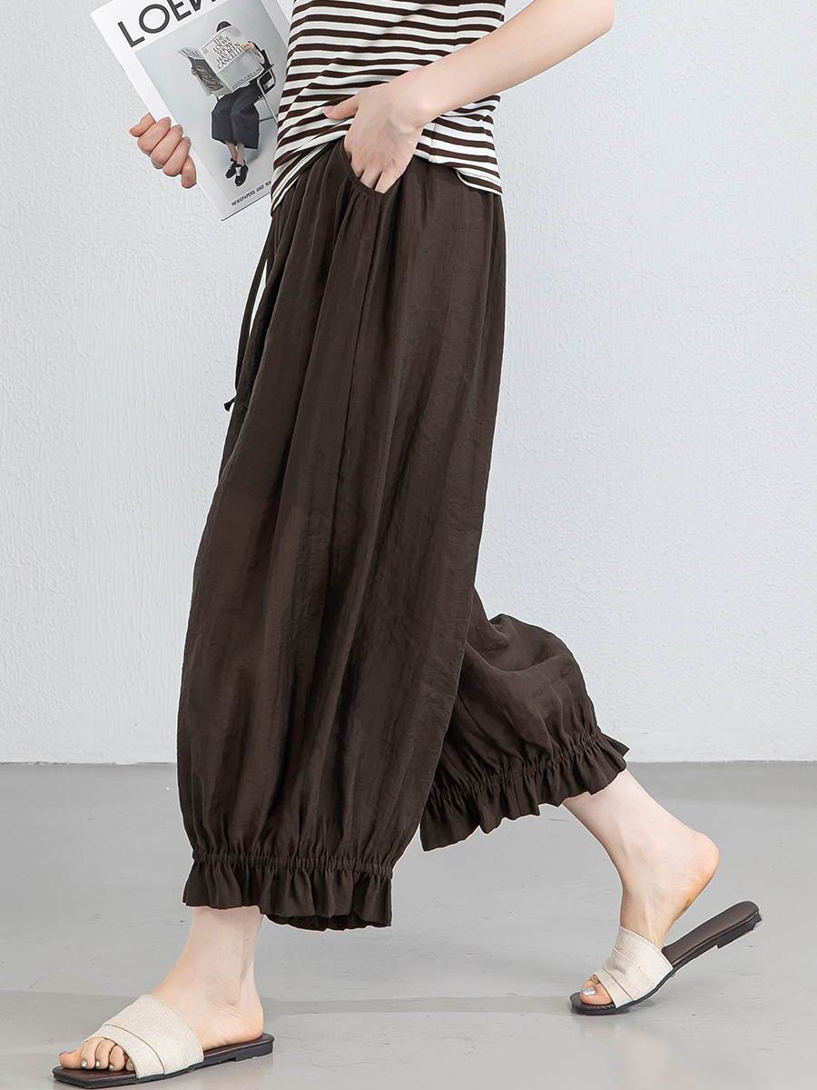 Quần culottes nữ ống rộng cạp chun co giãn, chất liệu Lyocell thoáng mát, dáng hoa tulip che khuyết điểm — màu đen