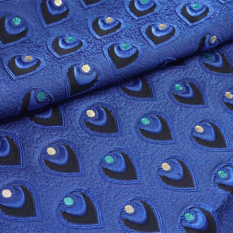 新款梭织洛丽塔剪花羽毛孔雀毛提花面料色织格子定制