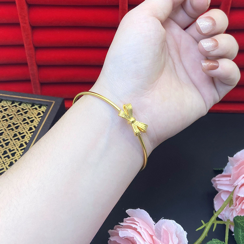 Pulsera de arco de mariposa dibujo ajuste de oro de arena vietnamita no desvanecerse universal dulce oro chapado latón Yiwu joyerías suministro