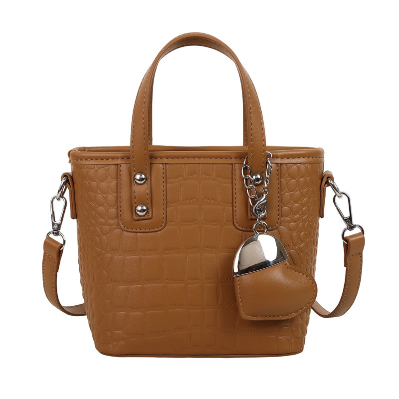 Bolso de alta calidad con textura 2025 verano nuevo estilo bolso de hombro con patrón de cocodrilo moda amor bolso de mensajero mujer